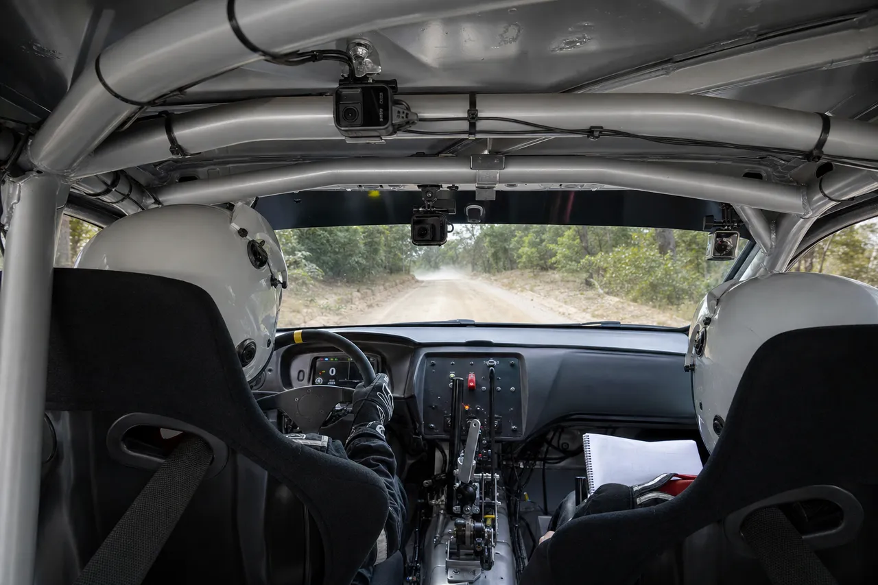 Action cameras mounted at several points in a race car for an onboard video system.